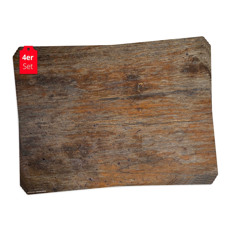 May include: A set of four brown wooden placemats with a rustic wood grain texture. The placemats are rectangular and have rounded corners. The label on the placemat reads "4er Set".