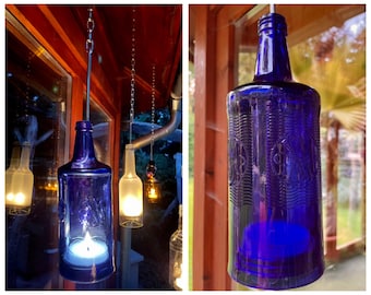 Lantern made from an Italian water bottle - a bottle boy with glass relief - special unique piece with wire insert