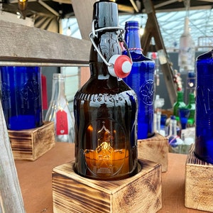 Table lamp one-flame with Altenmünster swing top bottle - glass on wood - special unique piece on squared timber - commissioned work