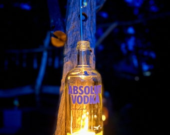 Lantern made from Absolut Standard Vodka bottle - with a picture of the Swedish distillery printed on it - special unique item with wire insert