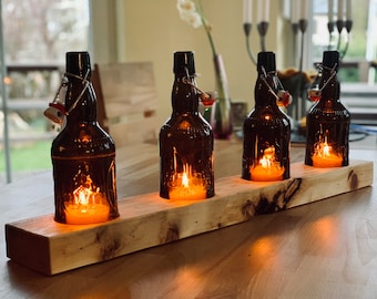 Table lamp with old beer bottles - glass on wood - special unique piece on roof batten or squared timber - commissioned work