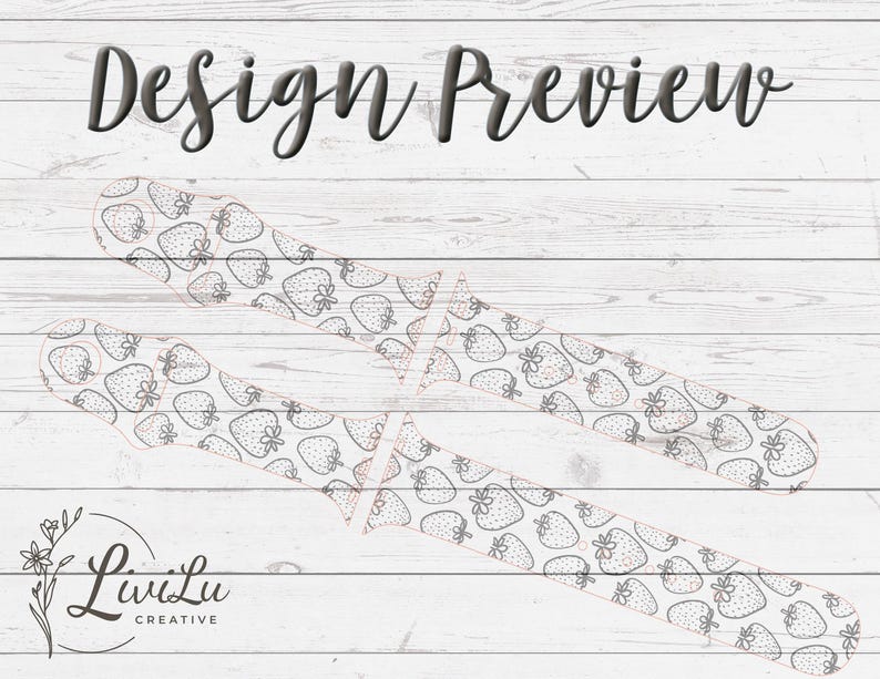 Two watch band outlines are shown with a repeating pattern of strawberries and leaves on a white wooden background.