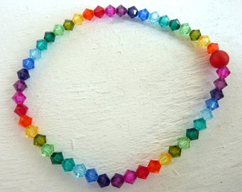 Rainbow glass bead bracelet with polaris bead