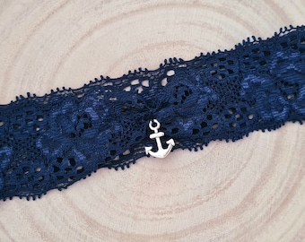 Garter made of dark blue elastic lace with a pendant of your choice