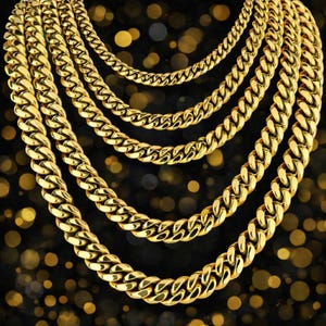 May include: Several gold-coloured curb chain necklaces of different lengths. The chains are set against a dark background with bokeh lights, emphasising the jewellery's shine and detail. The chains are made of interlocking links.
