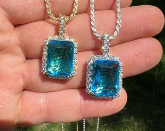 Moissanite & Simulated Blue Topaz Pendant: Sterling Silver Rectangular Halo