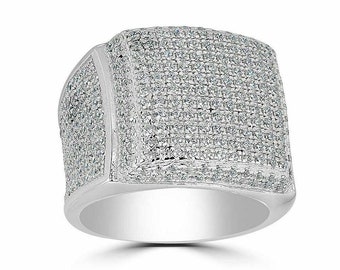 May include: A silver ring with a square-shaped top that is completely covered in small, clear diamonds.