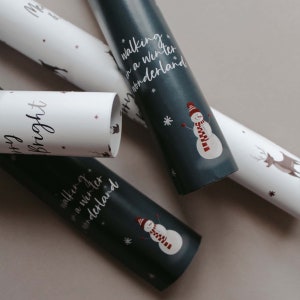 Christmas wrapping paper range including reindeer and snowman