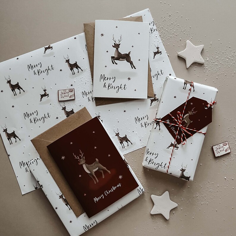 Reindeer Christmas wrapping paper, white and red with matching gift tags and greetings cards