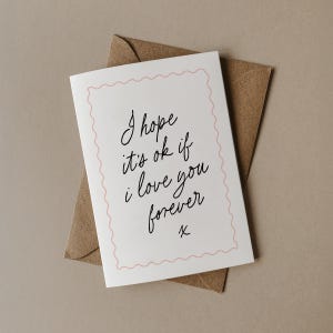 front of valentines card with the words I hope its ok if I love you forever