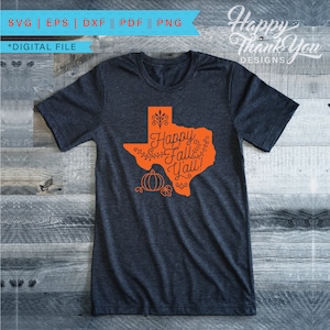 May include: A dark gray t-shirt with an orange outline of the state of Texas. Inside the outline is the text "Happy Fall Y'all!" with a pumpkin and floral accents.
