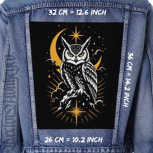 May include: A blue denim jacket featuring a large rectangular back patch with a black background and a white owl illustration. The design includes a yellow crescent moon, stars, and clouds. Dimensions are 12.6 inches wide by 14.2 inches high.