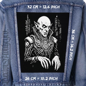 May include: A denim jacket with a large black patch featuring a detailed black and white illustration of a vampire with a cityscape background. The patch measures 32 cm by 36 cm and 26 cm.
