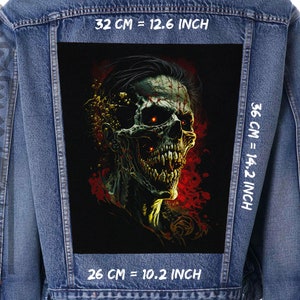 May include: A black denim jacket with a large, colorful patch on the back. The patch features a skull with glowing red eyes and a bloody mouth. The patch is 32 cm by 36 cm, or 12.6 inches by 14.2 inches.