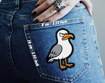 Divertente toppa termoadesiva a forma di gabbiano per tasche di jeans, giacche, gilet e flanella.