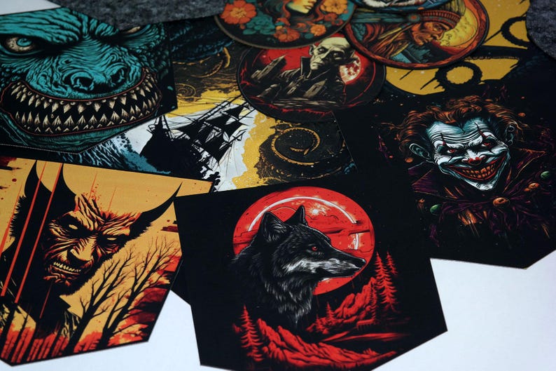 May include: A collection of colorful stickers featuring various illustrations, including a wolf, a creature with sharp teeth, a clown, and a ship. The stickers are on a dark background.