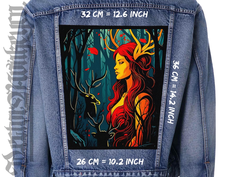 May include: A denim jacket with a large patch featuring a woman with red hair and golden antlers in a forest scene. The patch measures 12.6 inches wide and 14.2 inches high. The artwork includes a deer and the text "32 cm = 12.6 inch" and "36 cm = 14.2 inch".