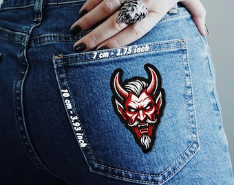 Toppa termoadesiva a forma di demone per tasche di jeans, giacche e gilet.