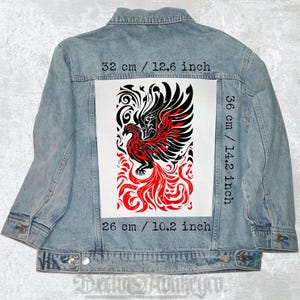 May include: Light blue denim jacket with a large rectangular patch on the back. The patch features a black and red phoenix design, measuring 12.6 inches wide, 14.2 inches tall, and 10.2 inches long.