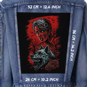 May include: A black and red embroidered patch featuring a woman with a bloody face and a snarling wolf. The patch is 10.2 inches wide, 12.6 inches tall, and 14.2 inches long.