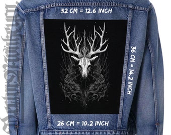 May include: A black denim jacket with a black patch on the back featuring a white graphic of a deer skull with antlers in a forest setting. The patch measures 12.6 inches wide by 14.2 inches tall. The text "32 CM = 12.6 INCH", "36 CM = 14.2 INCH", and "26 CM = 10.2 INCH" is printed on the jacket.