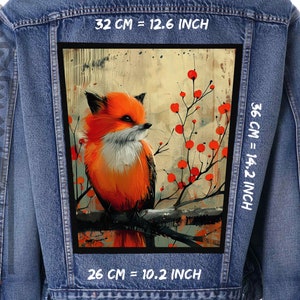 May include: A denim jacket with a patch featuring a stylized orange fox with white fur on its chest, perched on a branch with red berries. The patch measures 12.6 inches wide by 14.2 inches tall.