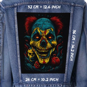 May include: A denim jacket with a black patch featuring a scary clown with red hair, yellow teeth, and a green and blue background. The patch is 32 cm wide, 36 cm tall, and 26 cm deep.