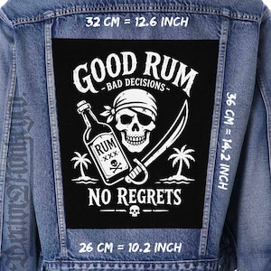 May include: A denim jacket with a black patch featuring a pirate skull, a rum bottle, and the words "GOOD RUM - BAD DECISIONS - NO REGRETS." Patch dimensions are 32 cm wide and 36 cm tall.