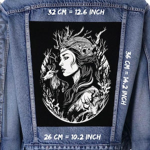 May include: Black and white illustration of a woman with a crown of antlers and a deer, surrounded by trees. The image is on a black background and measures 12.6 inches wide by 14.2 inches tall.