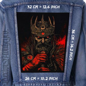 May include: A black and red embroidered patch of a king with a crown, holding a sword. The patch is 12.6 inches wide, 14.2 inches tall, and 10.2 inches deep.