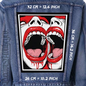 May include: A denim jacket with a large, rectangular patch featuring a graphic of two open mouths with red lips and teeth. The patch measures 10.2 inches by 14.2 inches and is 12.6 inches wide. The image has a black border and a white background.