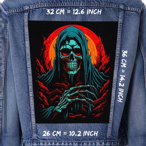 May include: A denim jacket with a large, rectangular patch featuring a grim reaper design. The artwork includes a skull with red eyes, a teal hooded cloak, and a red and orange background. The patch measures 12.6 inches wide by 14.2 inches high.
