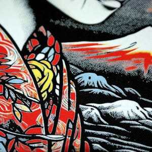 May include: A black and red patterned fabric with a design of a mountain range and a floral motif. The fabric has a textured surface and a graphic print.