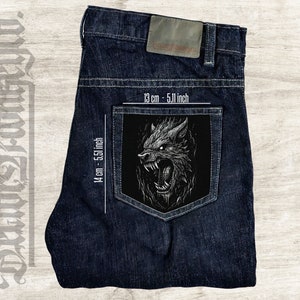 May include: A pair of dark blue denim jeans with a black and white wolf graphic patch on the back pocket. The patch measures 5.51 inches by 5.11 inches.