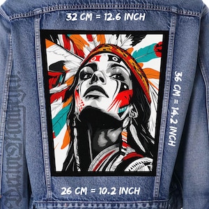 May include: A denim jacket with a large, rectangular patch featuring a Native American woman with a headdress and face paint. The patch measures 12.6 inches by 14.2 inches, and 10.2 inches wide. The artwork includes red, orange, and white feathers.