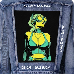 May include: A black and green graphic patch of a woman wearing a futuristic outfit with goggles and headphones. The patch is 32 cm wide, 36 cm tall, and 26 cm deep.
