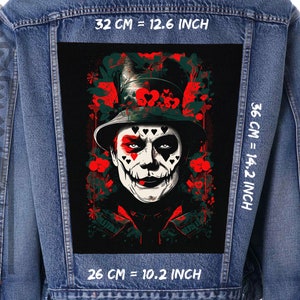 May include: A denim jacket with a black and red patch featuring a character with a top hat, a joker's smile, and a playing card design. The patch is 12.6 inches wide and 14.2 inches tall.