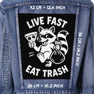 May include: A denim jacket with a large black patch featuring a white raccoon holding pizza and a bag. The text "LIVE FAST EAT TRASH" is above and below the raccoon. Patch dimensions are 12.6 inches by 14.2 inches.