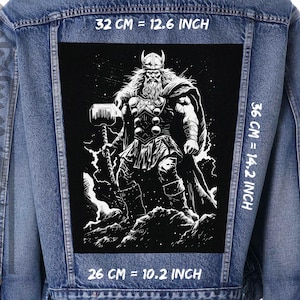 May include: Black and white illustration of Thor, a Norse god, holding a hammer. The image is on a black background with a white border. The image is 32 cm by 36 cm, or 12.6 inches by 14.2 inches.