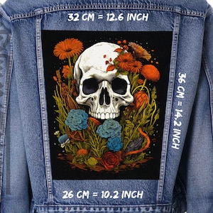 May include: A black and white skull with floral details, surrounded by colorful flowers and leaves. The skull is on a black background. The image is 32 cm x 36 cm, or 12.6 inches x 14.2 inches.