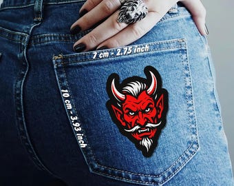 Toppa termoadesiva a forma di testa di diavolo per tasche di jeans, giacche e gilet.