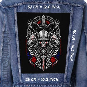 May include: A blue denim jacket featuring a large rectangular back patch with a Norse-inspired graphic of a skull in a helmet, two wolves, a raven, and a sword. The patch measures 12.6 inches wide by 14.2 inches high, with a 10.2 inch base width.