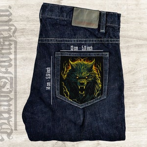 May include: A dark blue denim jean pocket with a black and yellow wolf graphic patch. The patch measures 5.11 inches by 5.51 inches.