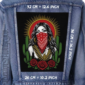 May include: A blue denim jacket featuring a large rectangular back patch with a graphic illustration of a person wearing a red bandana, a bullet belt, and a pendant, surrounded by cacti and red roses. The patch measures 12.6 inches by 14.2 inches.