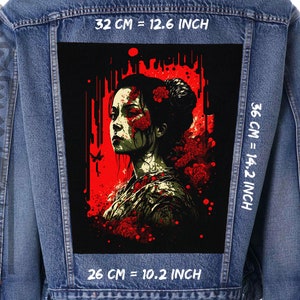 May include: A black and red embroidered patch featuring a woman with flowers in her hair. The patch is 12.6 inches wide, 14.2 inches tall, and 10.2 inches deep.