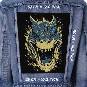 May include: A denim jacket with a large, rectangular patch featuring a blue and yellow dragon head with an open mouth and sharp teeth. The patch measures 32 cm wide, 36 cm high, and 26 cm long.