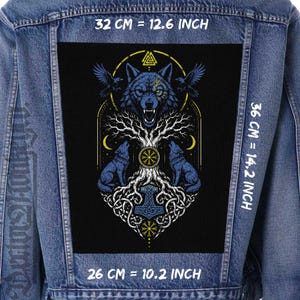 May include: A denim jacket with a large black patch featuring a blue wolf, ravens, and a tree design. The patch measures 12.6 inches wide and 14.2 inches tall. The design includes the text "32 CM = 12.6 INCH" and "36 CM = 14.2 INCH".