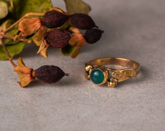 Delicate brass rings with various stones, golden boho jewelry