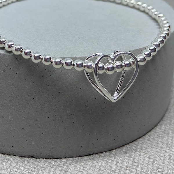 Sterling Silver heart beaded stretch bracelet with floating heart ,Sterling Silver stacking bracelet,silver heart charm bracelet, handmade