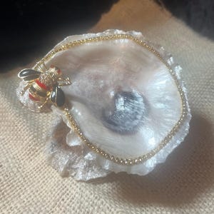 Gold Trimmed Oyster Shell Trinket Dish with Bee Brooch – Coastal Ring Holder Vanity Decor